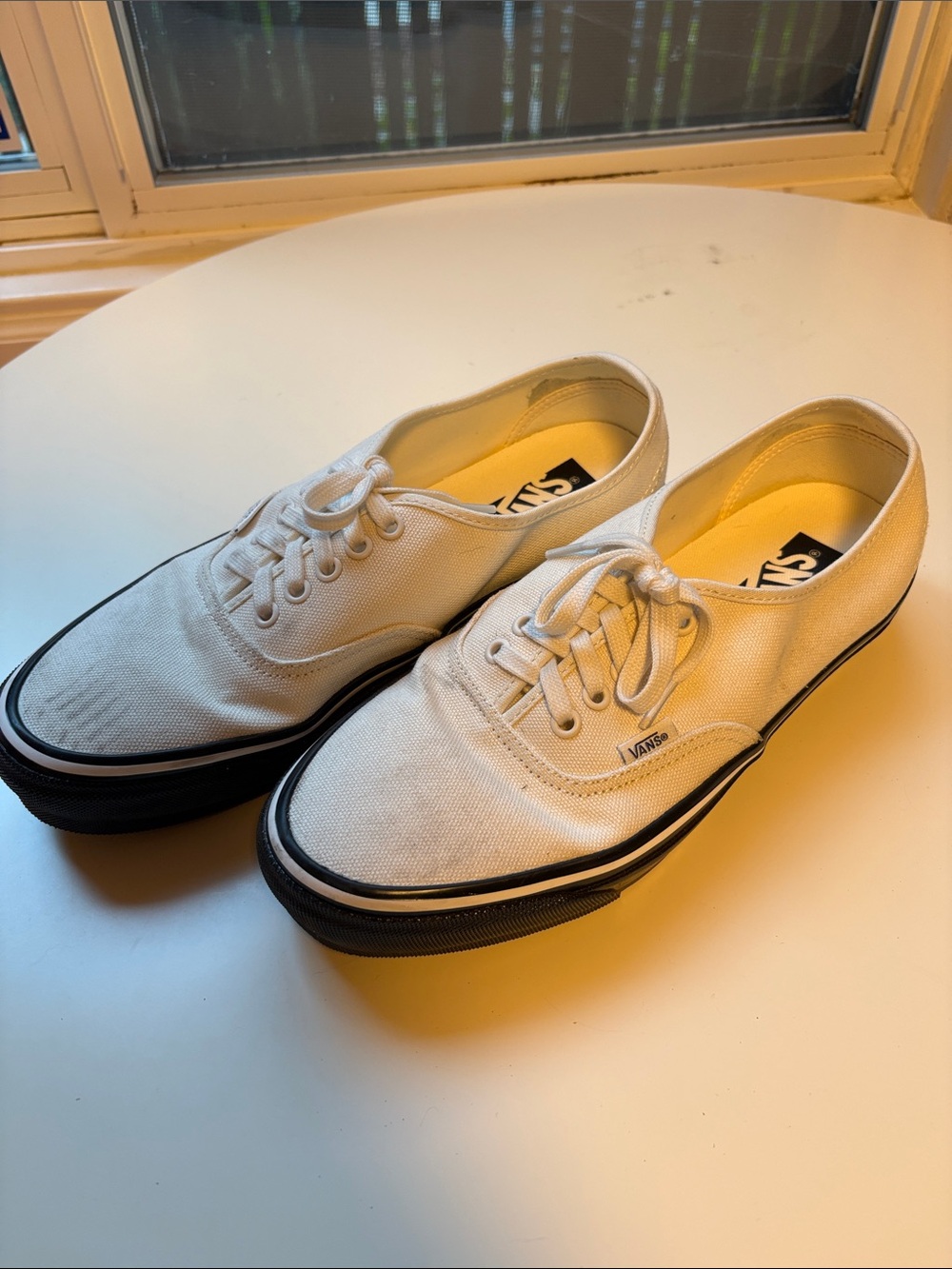 Vans Men’s White Canvas Sneakers with Black Midsole
